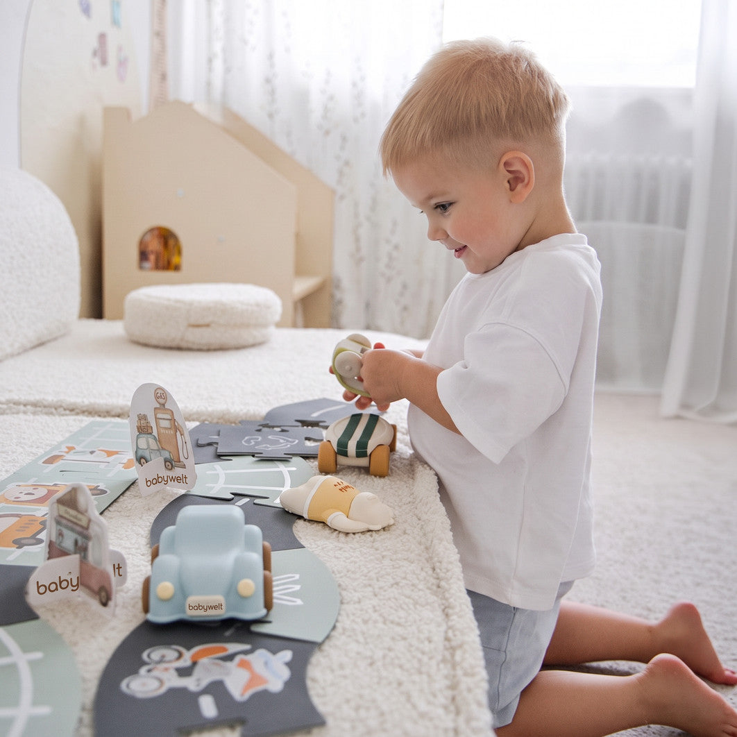 Set gioco Go & Explore - Bimbo gioca sul tappeto